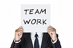 Businessman With Teamwork Card Stock Photo