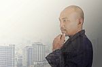 Businessman With The Cityscape Stock Photo