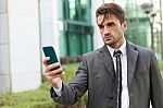 Businessman With The Smart Phone Stock Photo