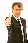 Businessman With Thumb Up Stock Photo