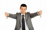 Businessman With Thumbs Down Stock Photo