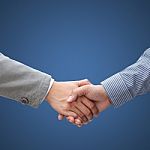 Businessmen Shaking Hands Stock Photo