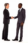 Businessmen Shaking Hands Stock Photo