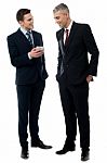 Businessmen Using Mobile Phone Stock Photo