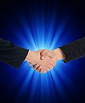 Businesspeople Handshaking Stock Photo