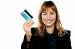 Businesswoman Displaying Cash Card Stock Photo