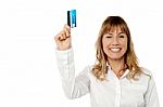 Businesswoman Displaying Cash Card Stock Photo