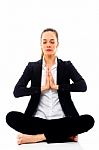 Businesswoman Doing Yoga Stock Photo