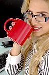 Businesswoman drinking coffee Stock Photo