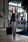 Businesswoman Entering To Hotel Stock Photo