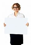 Businesswoman Holding Billboard Stock Photo