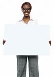 Businesswoman Holding Board Stock Photo