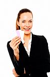 Businesswoman Holding Cards Stock Photo