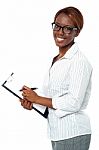 Businesswoman Holding Clipboard Stock Photo