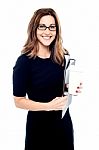 Businesswoman Holding Folders And Hot Drink Stock Photo