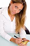 Businesswoman Holding Notepad Stock Photo