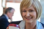 Businesswoman In An Open Restaurant Stock Photo