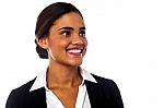 Businesswoman Looking Away With A Smile On Face Stock Photo