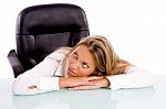 Businesswoman Lying On Desk Stock Photo