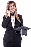 Businesswoman Receiving Exciting News Over The Phone Stock Photo