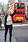 Businesswoman Standing At The Road Side Stock Photo