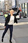 Businesswoman Standing At The Road Side Stock Photo