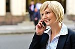 Businesswoman Using A Cell Phone Stock Photo