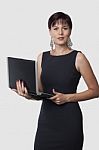 Businesswoman Using A Laptop Stock Photo