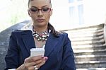 Businesswoman Using Smartphone Stock Photo