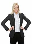 Businesswoman With Arms On Hips Stock Photo