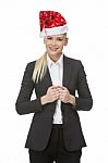 Businesswoman With Christmas Hat Stock Photo