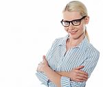 Businesswoman With Folded Arms Stock Photo