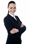 Businesswoman With Folded Arms Stock Photo