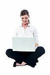 Businesswoman Working On Laptop Stock Photo