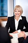 Businesswoman Working With Her Colleagues Stock Photo