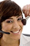 Call Center Lady Applying Make Up Stock Photo