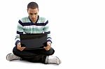 Casual Boy Sitting With Notebook Stock Photo