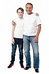 Casual Full Length Shot Of A Father And Son Stock Photo