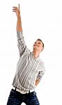 Casual Male Pointing Upward Stock Photo