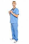 Casual Portrait Of A Confident Physician Standing Sideways Stock Photo