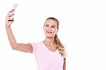 Casual Pretty Woman Taking A Selfie Stock Photo