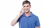 Casual Smiling Man Calling On The Phone Stock Photo