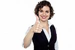 Charming Young Lady Gesturing Success Stock Photo