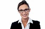 Cheerful Bespectacled Corporate Woman Stock Photo