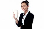 Cheerful Business Lady Holding Beverage Stock Photo