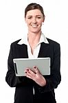 Cheerful Businesswoman Using Tablet Pc Stock Photo