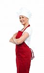 Cheerful Confident Female Chef Stock Photo