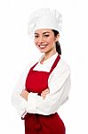 Cheerful Confident Young Female Chef Stock Photo