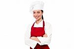 Cheerful Confident Young Female Chef Stock Photo