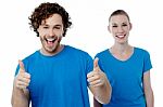 Cheerful Couple Holding Thumbs Up Stock Photo